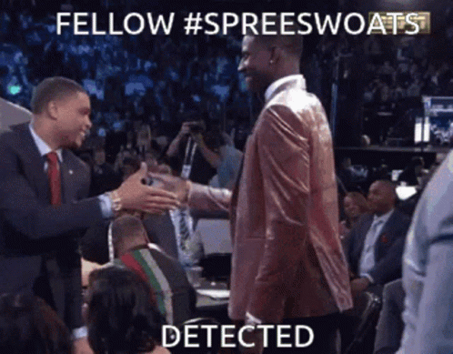 Man in Suit Shaking Hands
