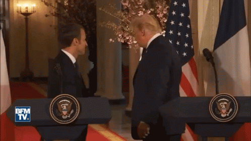 Man in Suit Signing Document Saying Goose