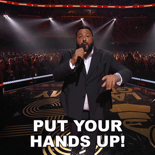 Man in Suit Singing Put Your Hands Up