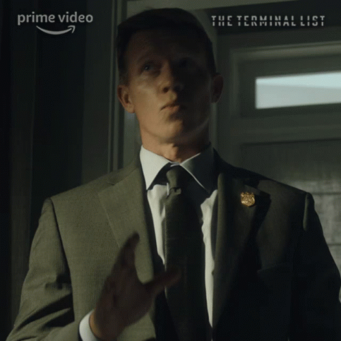 Man In Suit Sitting At Computer GIF