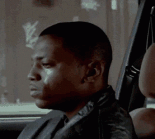 Man In Suit Sitting In Back Seat Of Car GIF