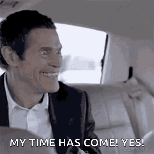 Man In Suit Sitting In Back Seat Of Car GIF