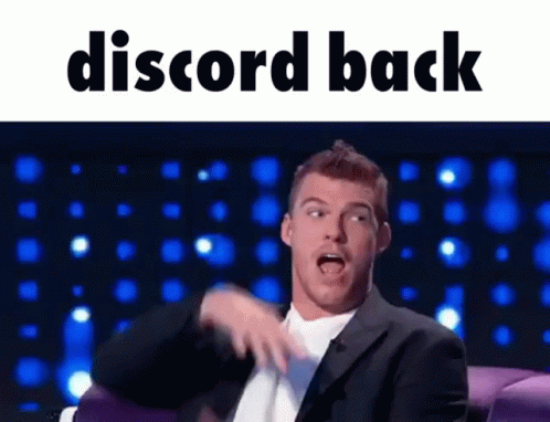 Man In Suit Sitting On Couch Discord Back GIF