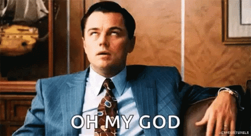 Man in Suit Sitting on Couch Says Oh My God