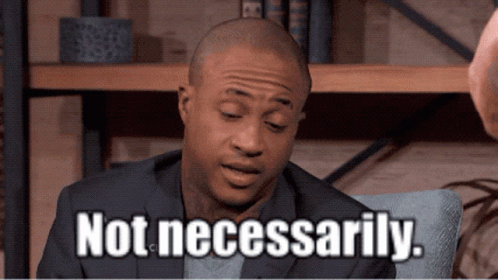 Man In Suit Sitting With Not Necessarily GIF