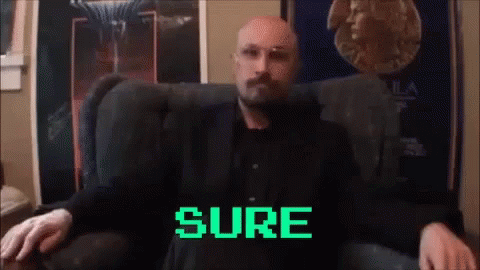 Man In Suit Sitting With Sure GIF