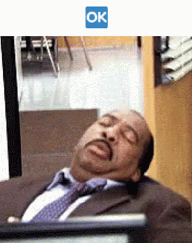 Man In Suit Sleeping At Computer With Ok GIF