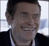 Man In Suit Smiling Making Funny Face GIF