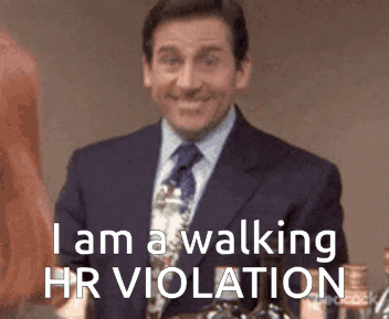 Man in Suit Smiling Saying HR Violation