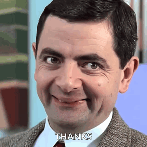 Man in Suit Smiling Saying Thanks