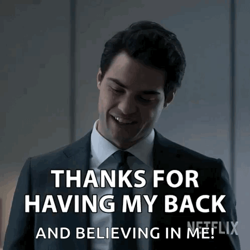 Man in Suit Smiling Saying Thanks for Having My Back