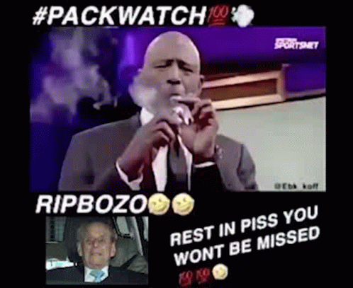 Man In Suit Smoking At Microphone In Car GIF
