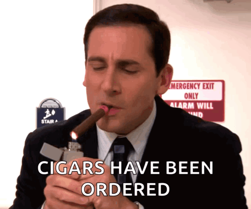 Man in Suit Smoking Cigar