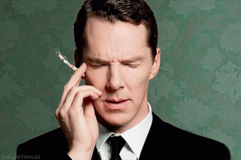 Man In Suit Smoking Cigarette Lost Smiles GIF