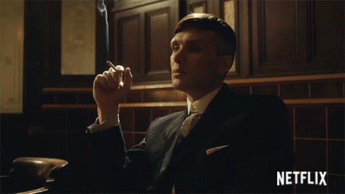Man In Suit Smoking Cigarette Netflix GIF