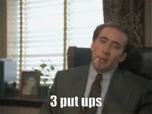 Man in Suit Smoking Cigarette Saying 3 Put Ups