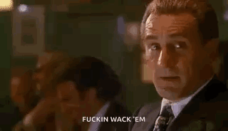 Man in Suit Smoking Cigarette Says Fuckin Wack Em