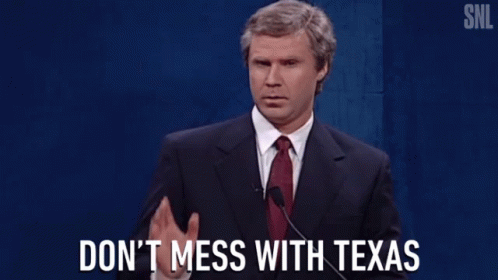 Man In Suit Speaking Into Microphone GIF