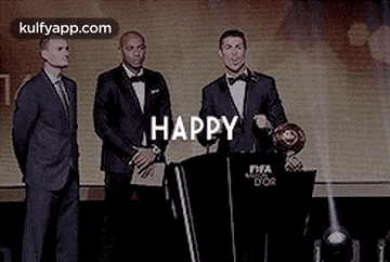 Man In Suit Speaking Podium Two Men Behind GIF