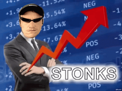 Man in Suit Standing in Front of Stonks Chart