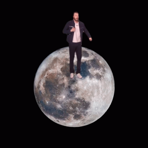 Man in Suit Standing on Moon