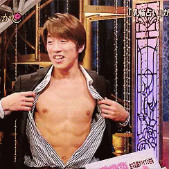 Man In Suit Taking Off Shirt GIF