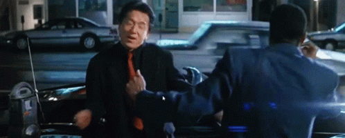 Man in Suit Talking in Car