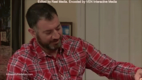 Man In Suit Talking In Kitchen Hansenvspredators.com GIF