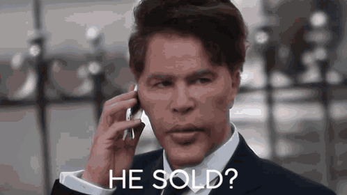 Man In Suit Talking On Cell Phone Says He Sold GIF