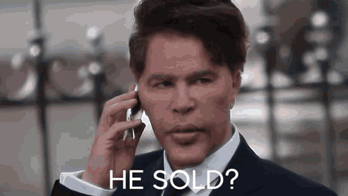 Man In Suit Talking On Cell Phone Says He Sold GIF