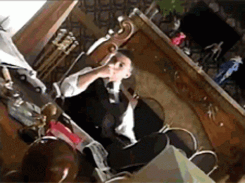 Man In Suit Talking On Phone GIF