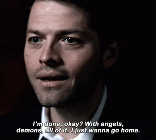 Man In Suit Talking To Angels And Demons GIF