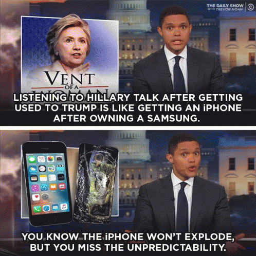 Man In Suit Talking To Hillary Clinton GIF