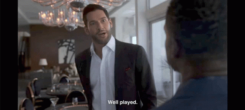 Man In Suit Talking To Man Saying Well Played GIF