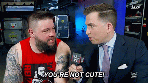 Man in Suit Talking to Man With Mic Saying You're Not Cute