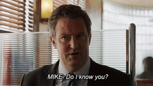 Man in Suit Talking to Mike Do I Know You