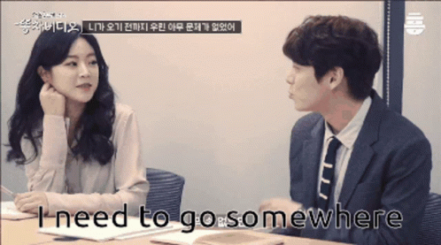 Man In Suit Talking To Woman GIF