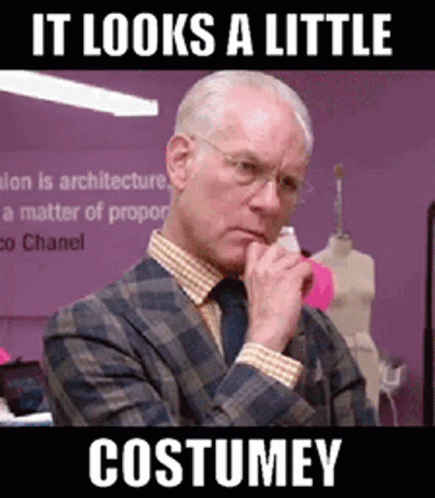 Man in Suit Thinking It Looks a Little Costumey