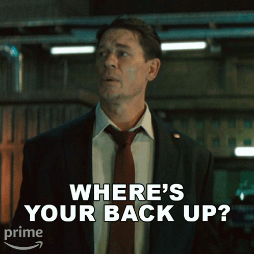 Man in Suit Tie Asking Where's Your Backup