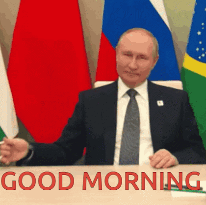 Man In Suit Tie Flags Good Morning Sign GIF