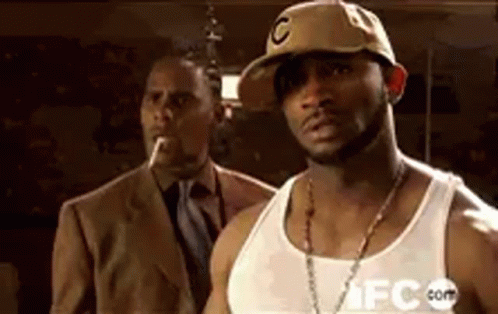 Man In Suit Tie Funny Face Colorful Hat GIF