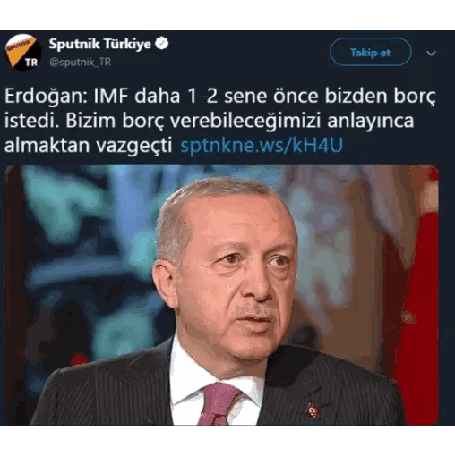 Man in Suit Tweet from Sputnik Turkey