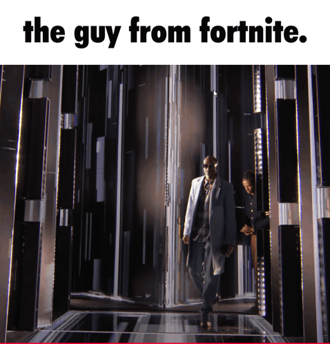 Man in Suit Walking in Dark Room The Guy From Fortnite