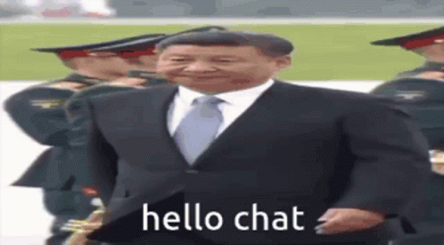 Man in Suit Walking in Front of Soldiers Saying Hello Chat