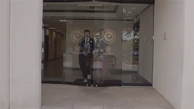 Man In Suit Walking Out GIF