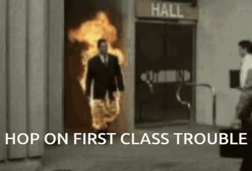 Man in Suit Walking Through Flaming Door Hop On First Class Trouble