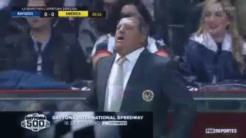 Man In Suit Watching Game GIF