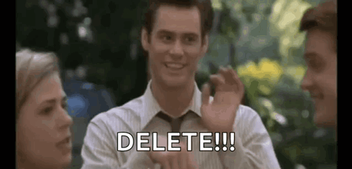 Man in Suit Waving and Saying Delete