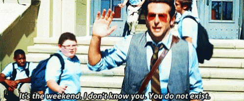 Man In Suit Waving To Children GIF