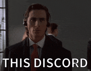 Man In Suit Wearing Headphones GIF